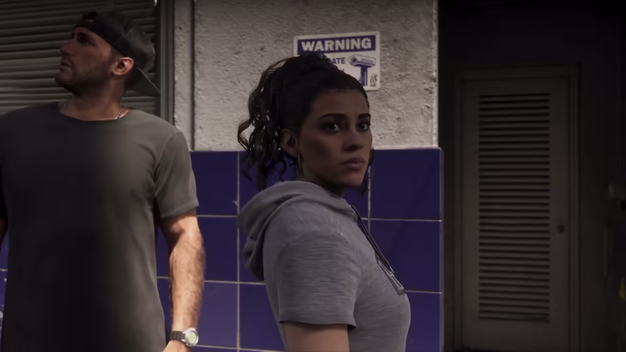 Jason and Lucia searching beside a building as the official Extended Look dialogue names Bayside
