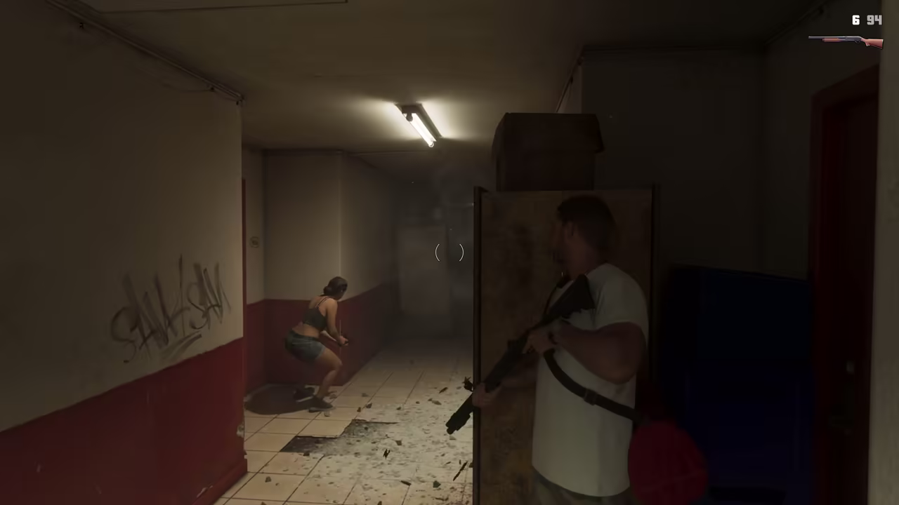 Jason and Lucia taking coordinated armed cover in a corridor in Rockstar's Extended Look