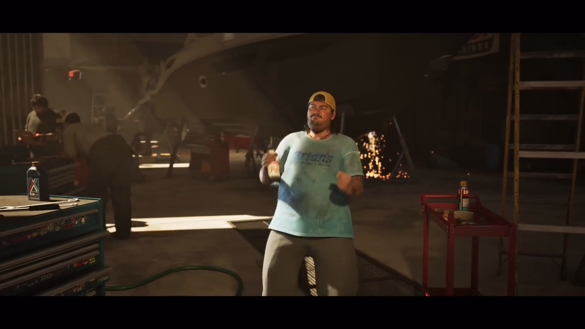 Unidentified hangar worker standing in front of an aircraft in official GTA 6 footage