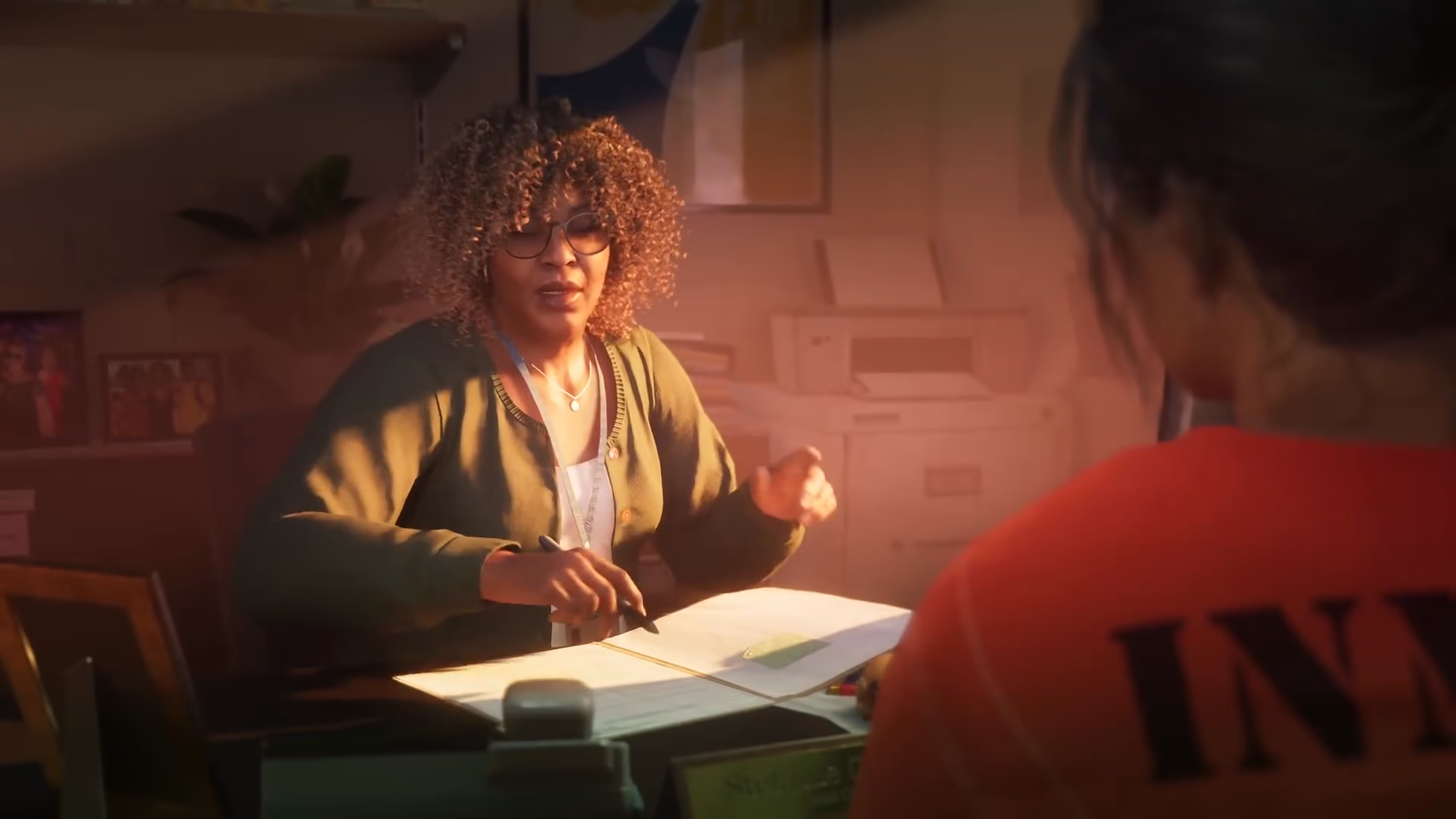 A Leonida penitentiary counselor speaking with Lucia in official GTA 6 Trailer 1 footage