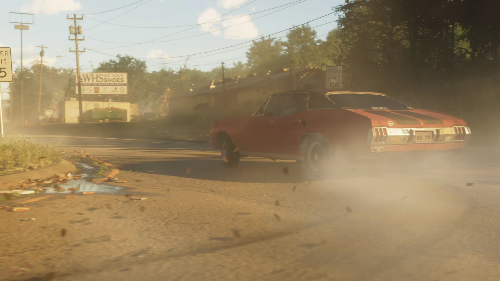 A red classic muscle coupe drifting on a Leonida street in official GTA 6 footage