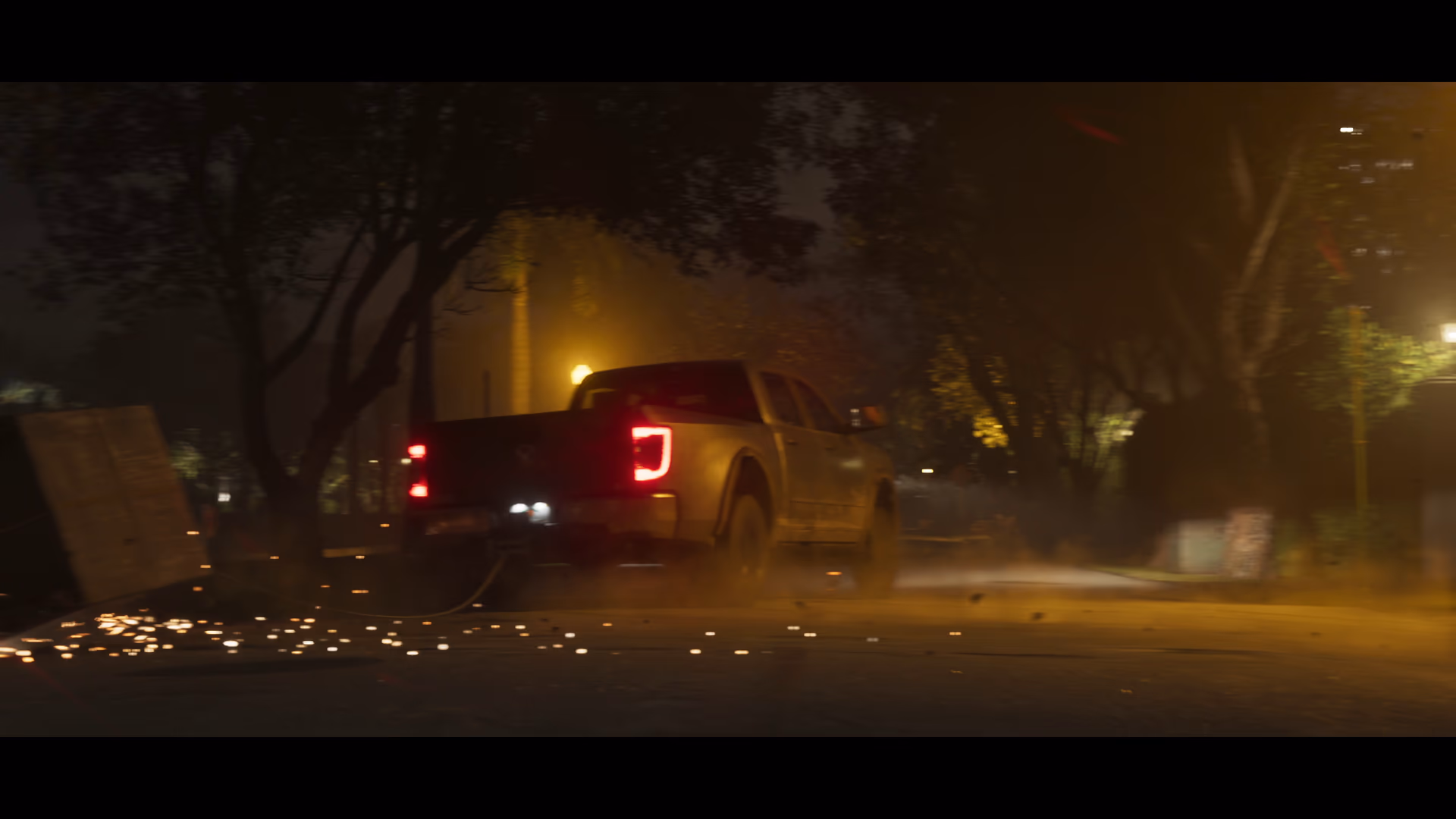 A dark off-road pickup accelerating through a Leonida night scene in official GTA 6 footage